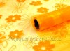 Svatební organza - žlutooranžová s lučními květy